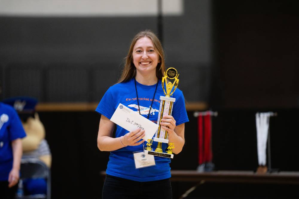 MSO 2025 Coach with trophy happy